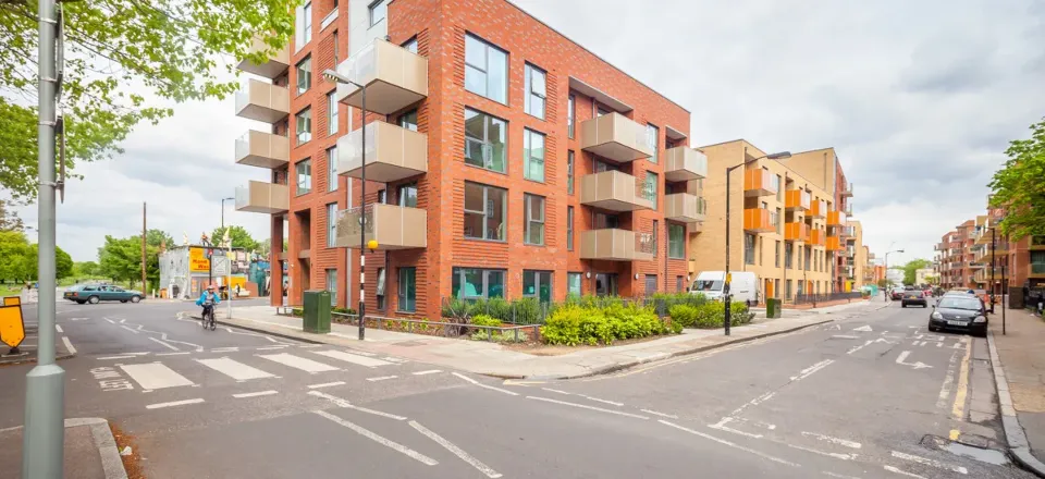 A street of new-build flats on a London corner