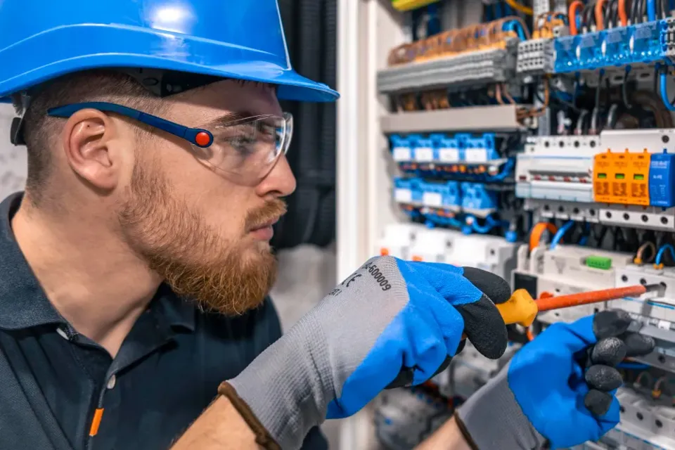 An electrician carrying out an electrical safety check