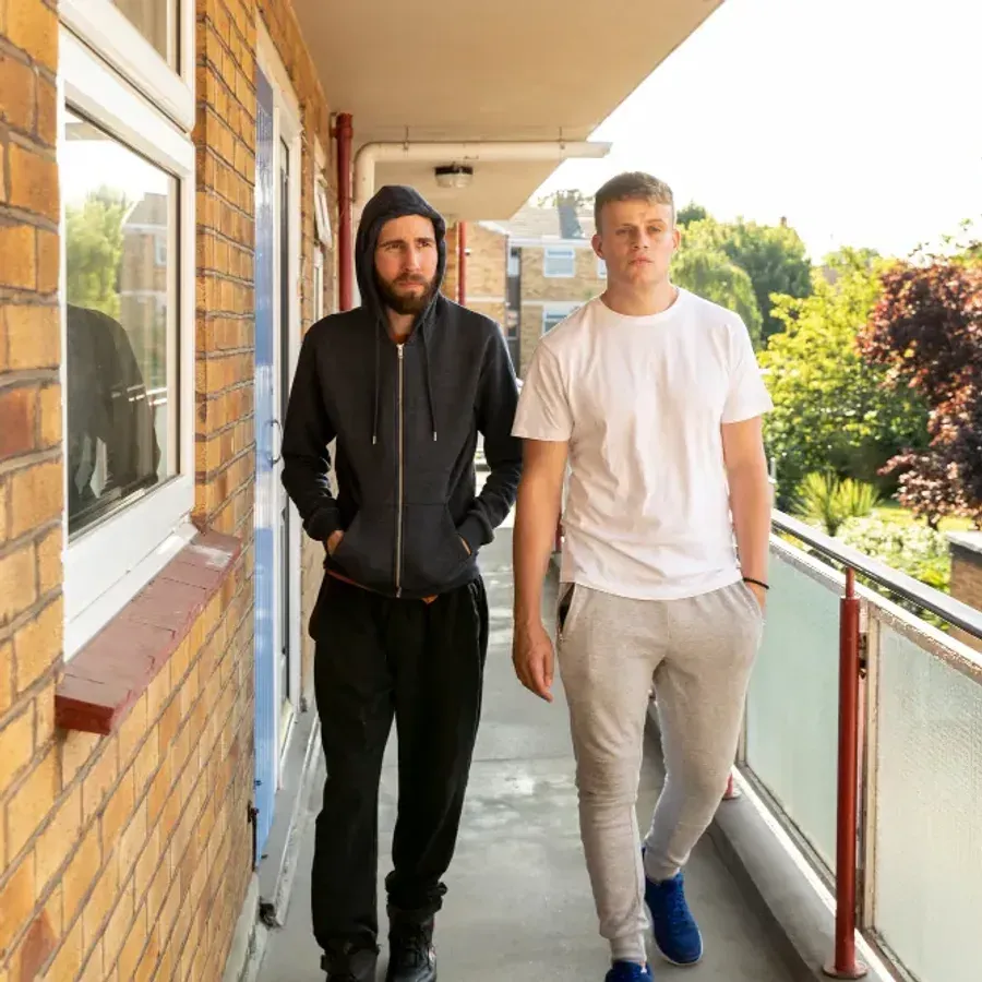 Residents in the shared spaces of their block