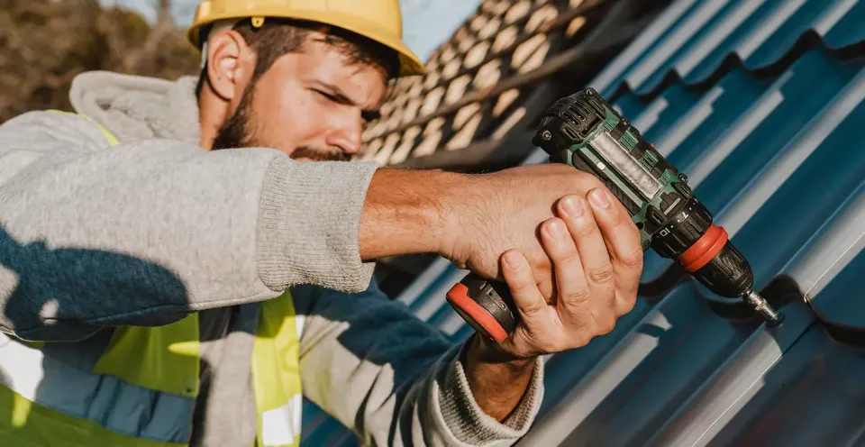 A repairs operative completing a job