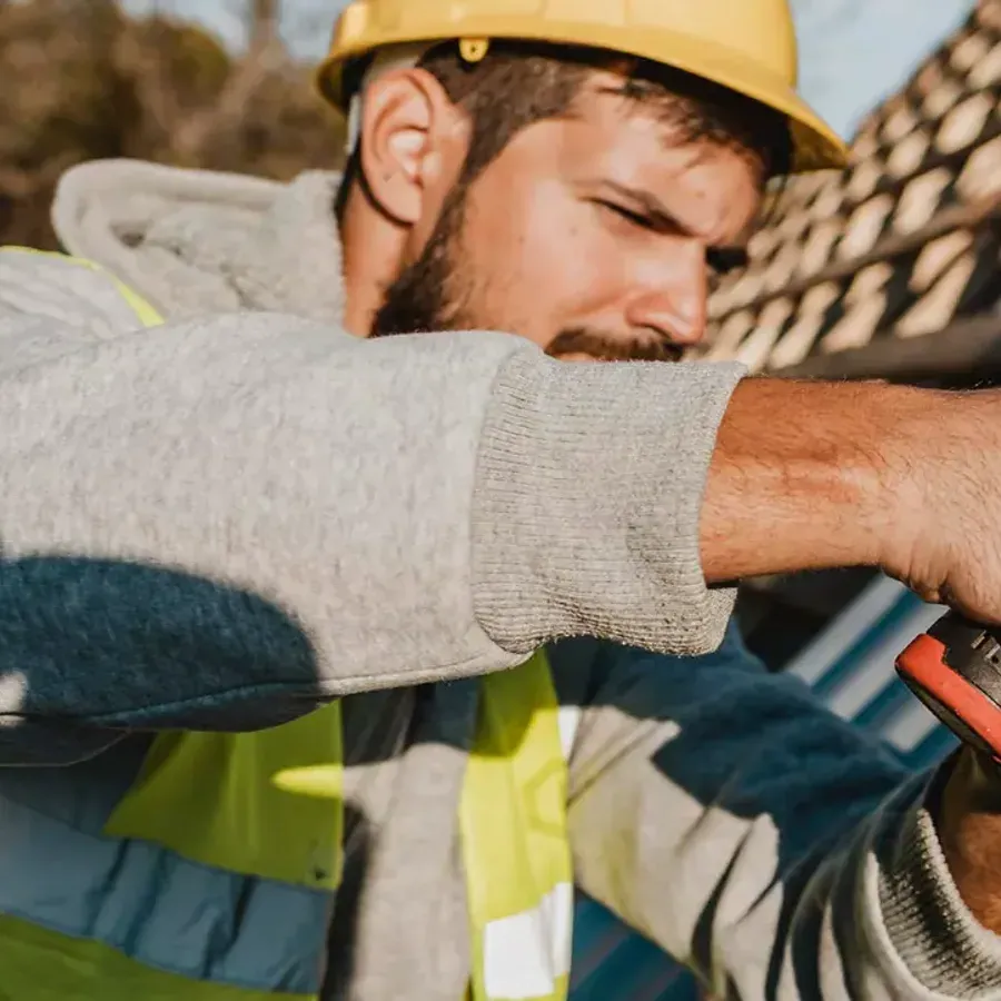 A carpenter completing a repair