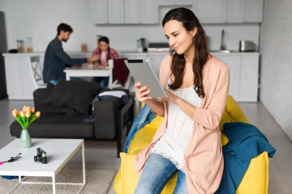 A resident using a housing app at home
